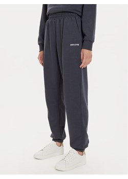 Athlecia Spodnie dresowe Giannis W Sweat EA243382 Niebieski Regular Fit ze sklepu MODIVO w kategorii Spodnie damskie - zdjęcie 182609700