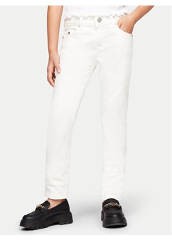 Tommy Hilfiger Jeansy Nora KG0KG07846 Biały Slim Fit ze sklepu MODIVO w kategorii Spodnie chłopięce - zdjęcie 182610053
