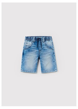 OVS Szorty jeansowe 1442679 Niebieski Regular Fit ze sklepu MODIVO w kategorii Spodenki chłopięce - zdjęcie 182610461