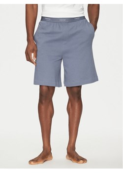 Calvin Klein Underwear Szorty piżamowe 000NM2707E Niebieski Regular Fit ze sklepu MODIVO w kategorii Piżamy męskie - zdjęcie 182611882