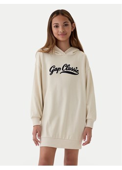 Gap Sukienka dzianinowa 526055-03 Beżowy Regular Fit ze sklepu MODIVO w kategorii Sukienki dziewczęce - zdjęcie 182612220