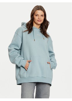 Guess Bluza V4BQ22 KCHX0 Niebieski Regular Fit ze sklepu MODIVO w kategorii Bluzy damskie - zdjęcie 182612603