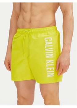 Calvin Klein Swimwear Szorty kąpielowe KM0KM01092 Żółty Regular Fit ze sklepu MODIVO w kategorii Kąpielówki - zdjęcie 182614970