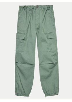 United Colors Of Benetton Joggery 4XZXCF03O Zielony Loose Fit ze sklepu MODIVO w kategorii Spodnie dziewczęce - zdjęcie 182616051