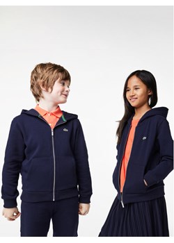 Lacoste Bluza SJ9723 Granatowy Regular Fit ze sklepu MODIVO w kategorii Bluzy chłopięce - zdjęcie 182616831