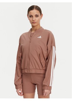 adidas Kurtka bomber Essentials 3-Stripes JD5318 Różowy Loose Fit ze sklepu MODIVO w kategorii Kurtki damskie - zdjęcie 182616832