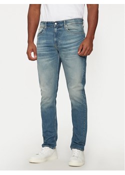 Calvin Klein Jeans Jeansy J30J326361 Niebieski Slim Fit ze sklepu MODIVO w kategorii Jeansy męskie - zdjęcie 182616873