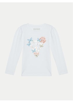 Guess Bluzka K5RI08 K6YW4 Biały Regular Fit ze sklepu MODIVO w kategorii Bluzki dziewczęce - zdjęcie 182618262