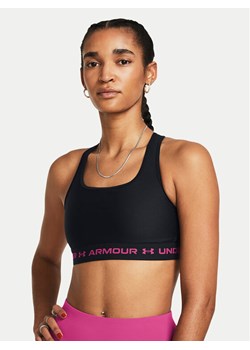 Under Armour Biustonosz sportowy Crossback Mid Bra 1361034-004 Czarny Compression Fit ze sklepu MODIVO w kategorii Biustonosze - zdjęcie 182618361