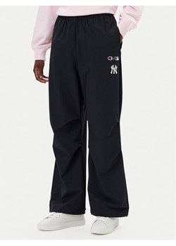 Champion Spodnie dresowe 117977 Czarny Loose Fit ze sklepu MODIVO w kategorii Spodnie damskie - zdjęcie 182618551
