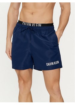 Calvin Klein Swimwear Szorty kąpielowe KM0KM00992 Granatowy Regular Fit ze sklepu MODIVO w kategorii Kąpielówki - zdjęcie 182619662