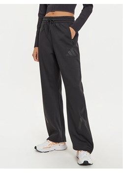 adidas Spodnie dresowe Z.N.E. Barrel JE7850 Czarny Loose Fit ze sklepu MODIVO w kategorii Spodnie damskie - zdjęcie 182619903