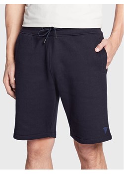 Guess Szorty sportowe Z2YD04 K9V31 Granatowy Regular Fit ze sklepu MODIVO w kategorii Spodenki męskie - zdjęcie 182620234