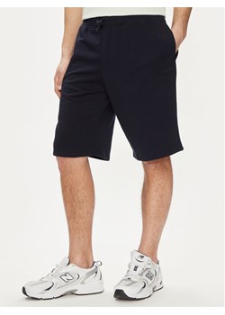 Guess Szorty materiałowe Clovis M4GD10 KBK32 Granatowy Loose Fit ze sklepu MODIVO w kategorii Spodenki męskie - zdjęcie 182620691
