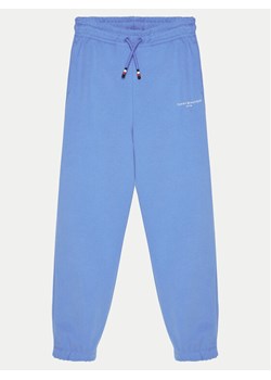 Tommy Hilfiger Spodnie dresowe KS0KS00596 Niebieski Regular Fit ze sklepu MODIVO w kategorii Spodnie chłopięce - zdjęcie 182620831