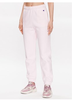 Champion Spodnie dresowe 116243 Różowy Regular Fit ze sklepu MODIVO w kategorii Spodnie damskie - zdjęcie 182621130