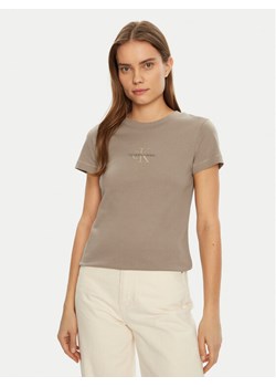 Calvin Klein Jeans T-Shirt Monologo J20J223563 Beżowy Slim Fit ze sklepu MODIVO w kategorii Bluzki damskie - zdjęcie 182621443