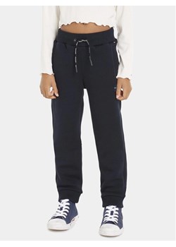 Tommy Hilfiger Spodnie dresowe KB0KB08278 D Niebieski Regular Fit ze sklepu MODIVO w kategorii Spodnie chłopięce - zdjęcie 182622761