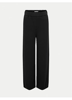 Kids ONLY Spodnie materiałowe 15316379 Czarny Loose Fit ze sklepu MODIVO w kategorii Spodnie dziewczęce - zdjęcie 182623200