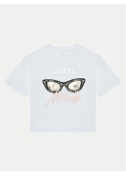 Guess T-Shirt J5RI40 K6YW4 Biały Regular Fit ze sklepu MODIVO w kategorii Bluzki dziewczęce - zdjęcie 182624644
