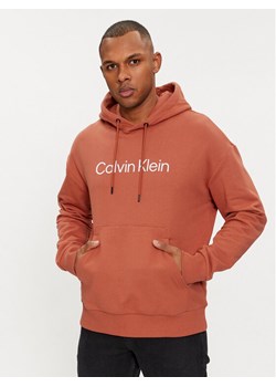 Calvin Klein Bluza Hero K10K111345 Pomarańczowy Relaxed Fit ze sklepu MODIVO w kategorii Bluzy męskie - zdjęcie 182624904