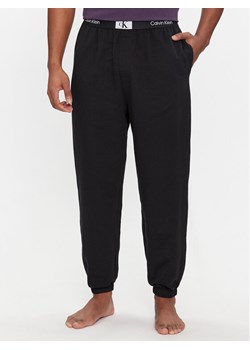 Calvin Klein Underwear Spodnie piżamowe 000NM2514E Czarny Regular Fit ze sklepu MODIVO w kategorii Piżamy męskie - zdjęcie 182625473