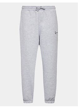 Karl Kani Spodnie dresowe Small Signature Essential 6006899 Szary Regular Fit ze sklepu MODIVO w kategorii Spodnie męskie - zdjęcie 182625483