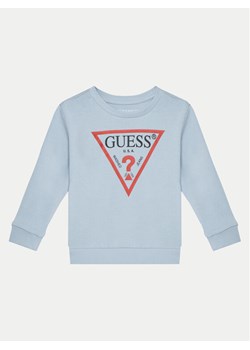 Guess Bluza N73Q10 KAUG0 Błękitny Regular Fit ze sklepu MODIVO w kategorii Bluzy chłopięce - zdjęcie 182626422