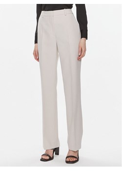 Calvin Klein Spodnie materiałowe Essential K20K206879 Szary Slim Fit ze sklepu MODIVO w kategorii Spodnie damskie - zdjęcie 182626701