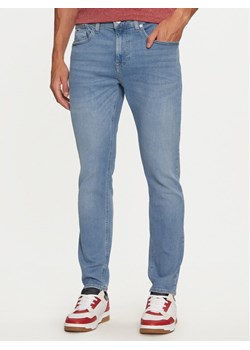 Tommy Jeans Jeansy Austin DM0DM20174 Niebieski Slim Tapered Fit ze sklepu MODIVO w kategorii Jeansy męskie - zdjęcie 182627720