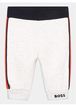 Boss Spodnie dresowe J94348 Szary Regular Fit ze sklepu MODIVO w kategorii Spodnie i półśpiochy - zdjęcie 182627874