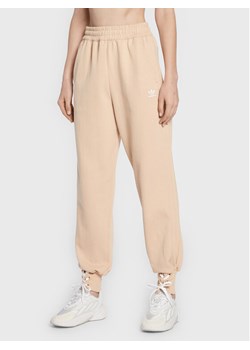 adidas Spodnie dresowe Always Original Laced HK5065 Beżowy Regular Fit ze sklepu MODIVO w kategorii Spodnie damskie - zdjęcie 182628570
