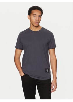 Calvin Klein Jeans T-Shirt J30J323482 Granatowy Regular Fit ze sklepu MODIVO w kategorii T-shirty męskie - zdjęcie 182629030