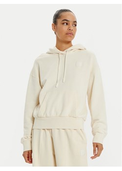 Lacoste Bluza SF2673 Écru Oversize ze sklepu MODIVO w kategorii Bluzy damskie - zdjęcie 182629460