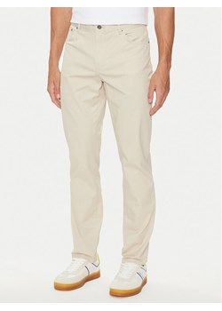 Tommy Hilfiger Spodnie materiałowe Denton MW0MW36429 Beżowy Straight Fit ze sklepu MODIVO w kategorii Spodnie męskie - zdjęcie 182629754