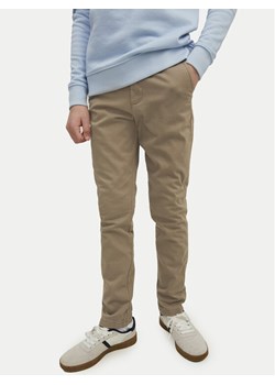 Jack&Jones Junior Chinosy Marco 12160026 Beżowy Slim Fit ze sklepu MODIVO w kategorii Spodnie chłopięce - zdjęcie 182630484