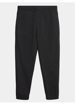 Champion Spodnie dresowe 404630 Czarny Regular Fit ze sklepu MODIVO w kategorii Spodnie chłopięce - zdjęcie 182630571