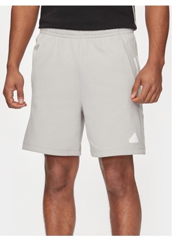 adidas Szorty sportowe Future Icons 3-Stripes IR9165 Szary Regular Fit ze sklepu MODIVO w kategorii Spodenki męskie - zdjęcie 182630770