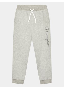 Champion Spodnie dresowe 306345 Szary Regular Fit ze sklepu MODIVO w kategorii Spodnie chłopięce - zdjęcie 182630790