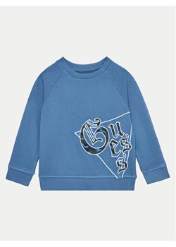 Guess Bluza N4BQ00 KAD74 Granatowy Regular Fit ze sklepu MODIVO w kategorii Bluzy chłopięce - zdjęcie 182630922