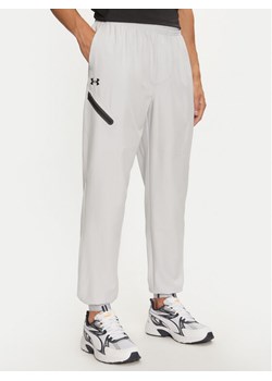 Under Armour Spodnie outdoor Unstoppable 1388823 Szary Loose Fit ze sklepu MODIVO w kategorii Spodnie męskie - zdjęcie 182631031