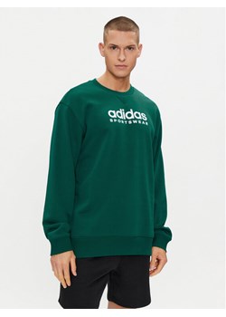 adidas Bluza All SZN Fleece Graphic IJ9440 Zielony Loose Fit ze sklepu MODIVO w kategorii Bluzy męskie - zdjęcie 182631741