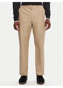 Dolce&Gabbana Spodnie materiałowe GV5ZHT FU5SW M0868 Beżowy Regular Fit ze sklepu MODIVO w kategorii Spodnie męskie - zdjęcie 182631774