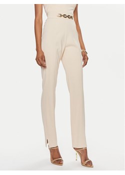 Marciano Guess Spodnie materiałowe 4GGB13 7074A Beżowy Regular Fit ze sklepu MODIVO w kategorii Spodnie damskie - zdjęcie 182632723