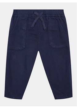 United Colors Of Benetton Spodnie dresowe 459TGF00L Granatowy Regular Fit ze sklepu MODIVO w kategorii Spodnie chłopięce - zdjęcie 182633382