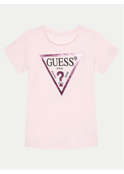 Guess T-Shirt J73I56K 8HM0 Różowy Regular Fit ze sklepu MODIVO w kategorii Bluzki dziewczęce - zdjęcie 182633460
