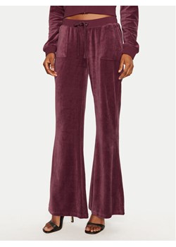 Juicy Couture Spodnie dresowe Caisa JCSEBJ008 Bordowy Slim Fit ze sklepu MODIVO w kategorii Spodnie damskie - zdjęcie 182634564