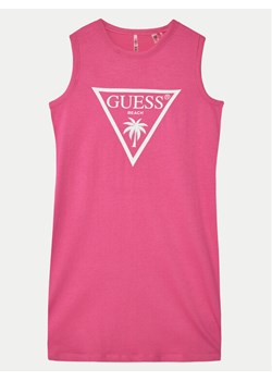 Guess Sukienka codzienna J4GK35JA914 Różowy Regular Fit ze sklepu MODIVO w kategorii Sukienki dziewczęce - zdjęcie 182636463