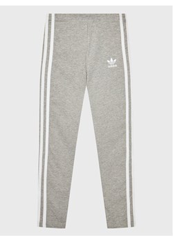 adidas Legginsy adicolor HI2277 Szary Extra Slim Fit ze sklepu MODIVO w kategorii Spodnie dziewczęce - zdjęcie 182636814