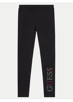 Guess Legginsy J4GB10 J1314 Czarny Regular Fit ze sklepu MODIVO w kategorii Spodnie dziewczęce - zdjęcie 182638334